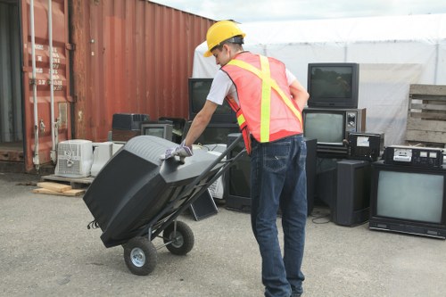 Expert sorting items during garage clearance in Basildon